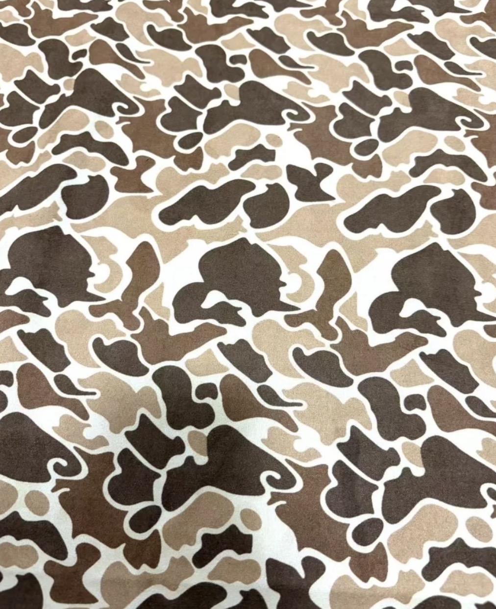 Brown & tan camouflage fabric